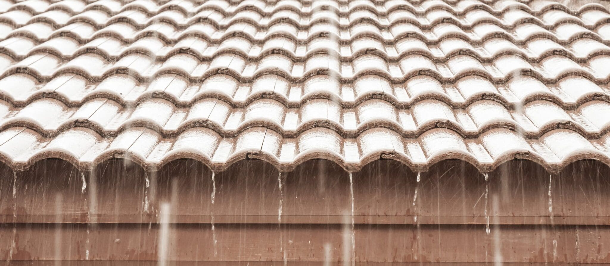 roof tiled with rain falling through them
